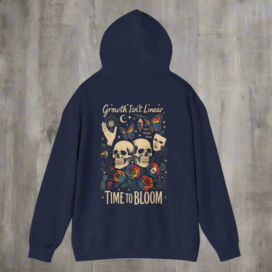 Tattoo flash-style hoodie with skulls, roses, butterflies, and motivational text