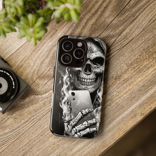 Grim Reaper Hooded Skeleton Phone Case featuring a skull design with a phone in hand on a wooden surface.