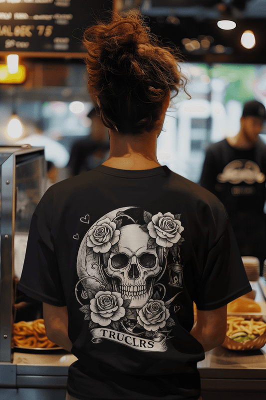 Back view of skull and roses under crescent moon graphic with minimal front moon rose motif