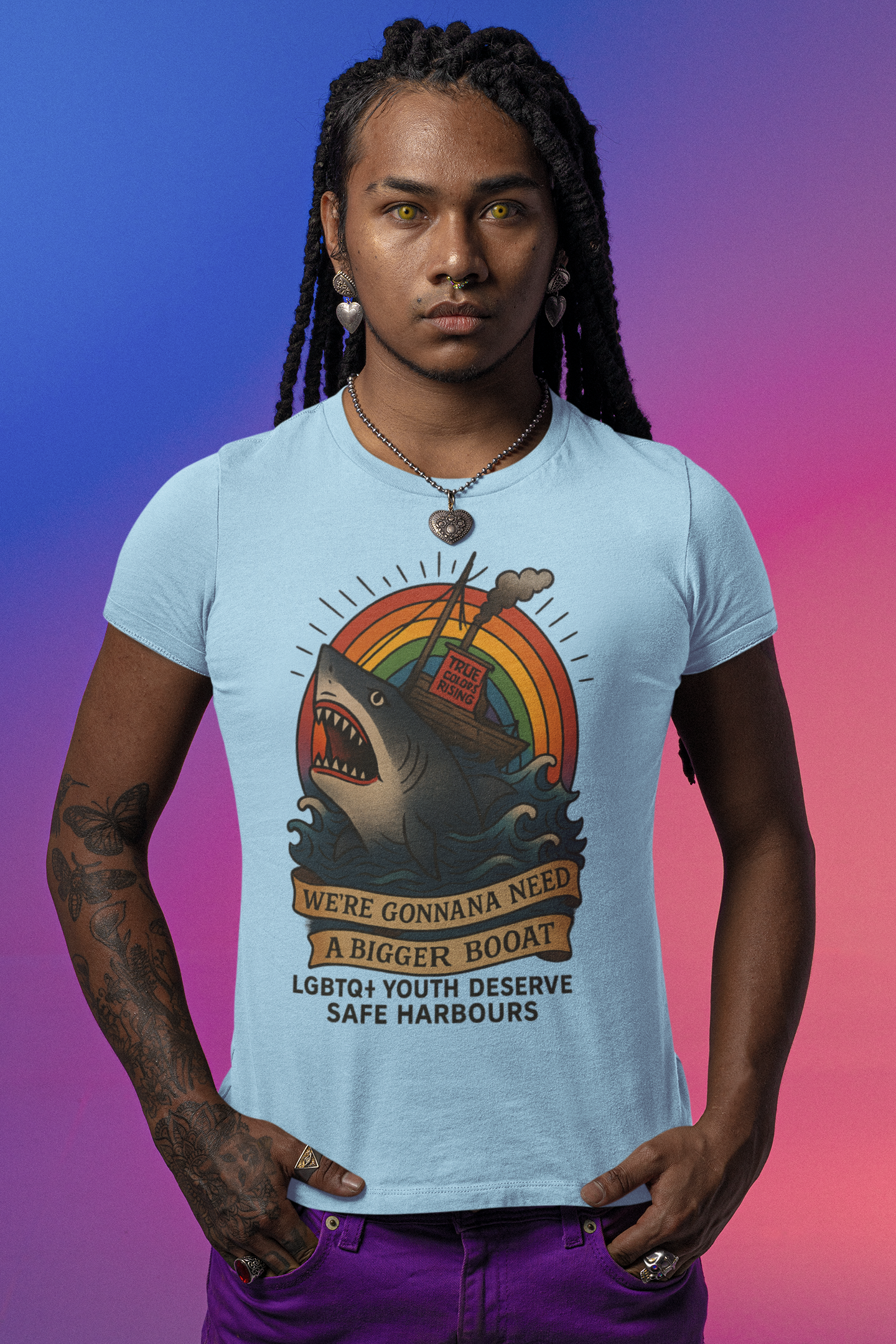 Person wearing a light blue t-shirt with a graphic design and text, standing against a gradient background. Jaws Quote. Shark Love. LGBTQ+ T shirt