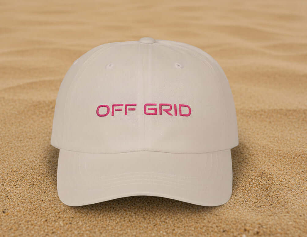Close-up of OFF GRID embroidered dad cap in beige with unstructured low profile fit