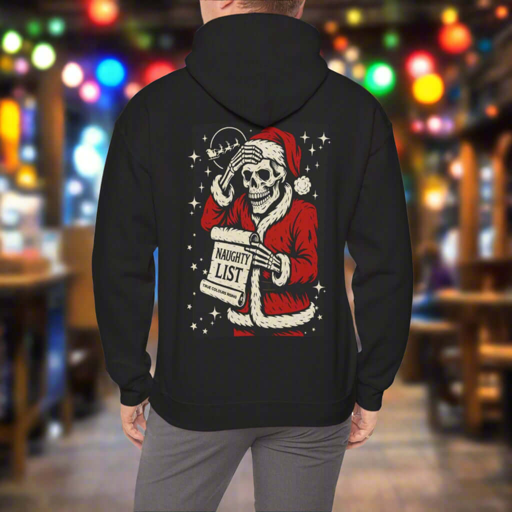 Back of black hoodie with retro-style skeleton Santa and naughty list”