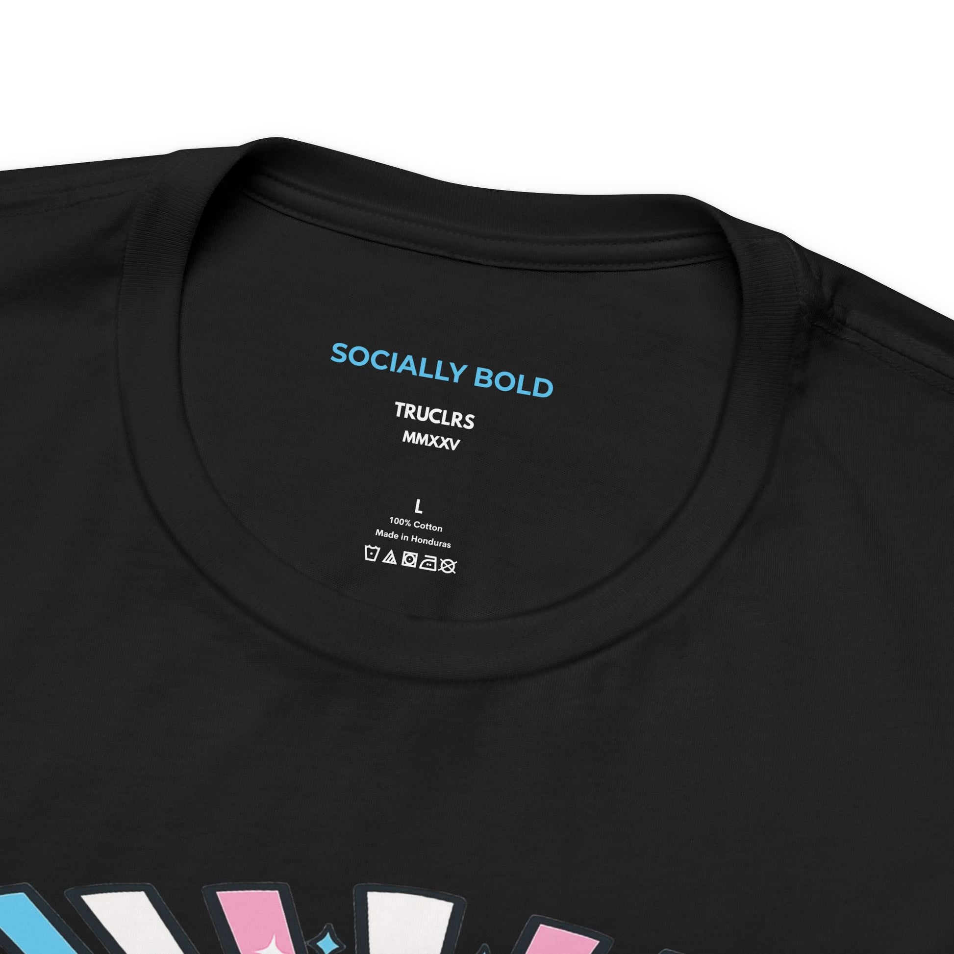 Close up of trans pride graphic printed on premium cotton black t shirt