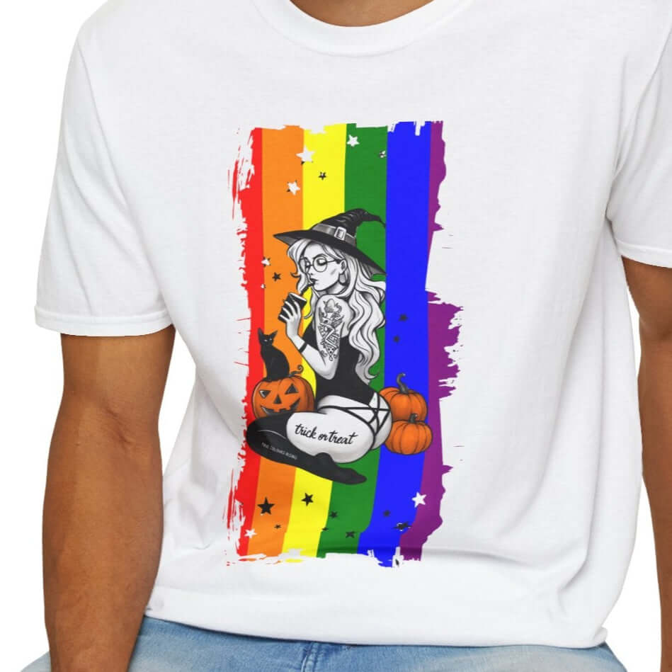 Witchy Pride Halloween T-shirt featuring a witch, pumpkins, and a vibrant rainbow flag background.