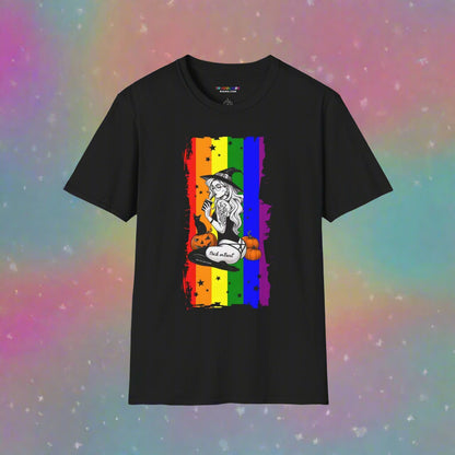 Witchy Pride Halloween T-shirt with rainbow flag background, featuring a witch, pumpkins, and playful text.