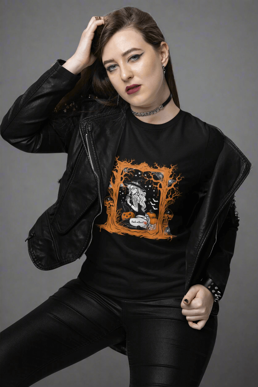 Sexy Halloween witch t-shirt for women featuring a gothic pin-up witch, black cat, pumpkins, skulls, bats, spider webs, and a blood-red handprint