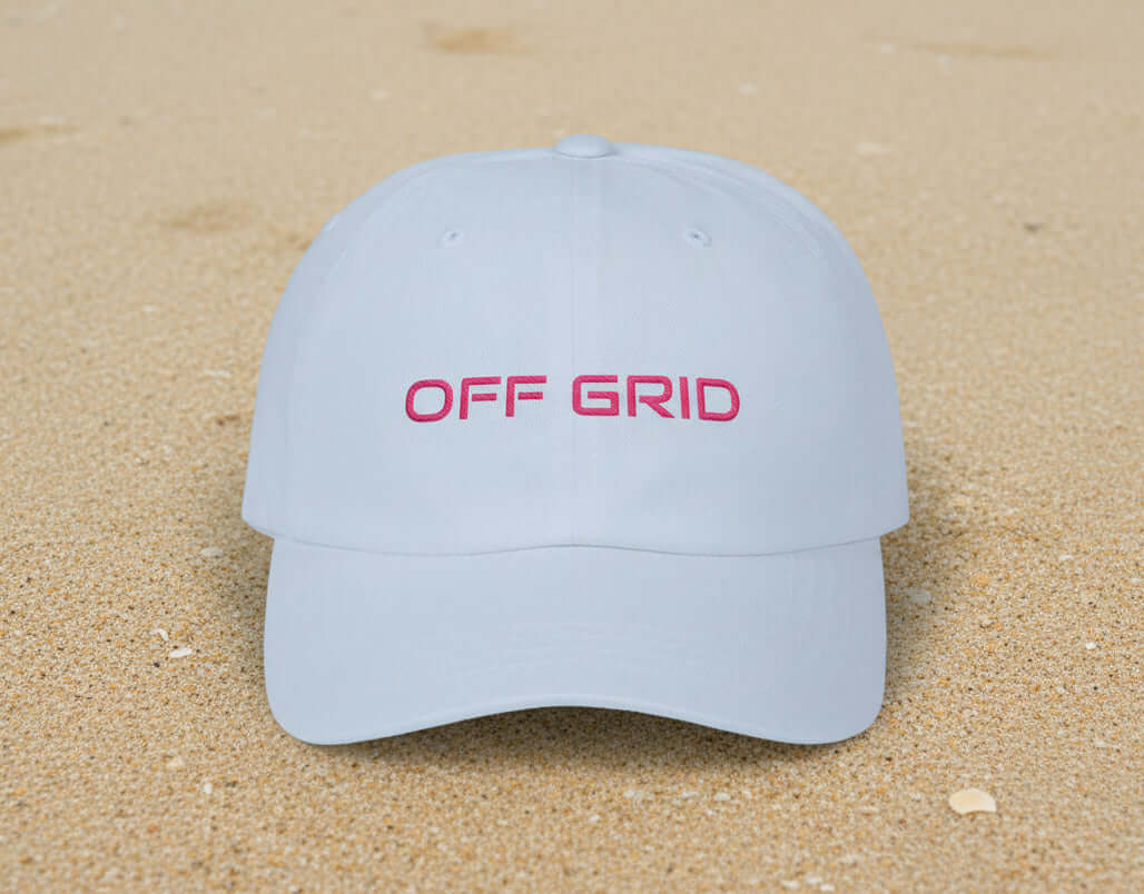Light blue OFF GRID dad cap with pink embroidery, low profile fit