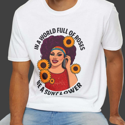 White graphic t-shirt with drag queen illustration surrounded by sunflowers and empowerment quote