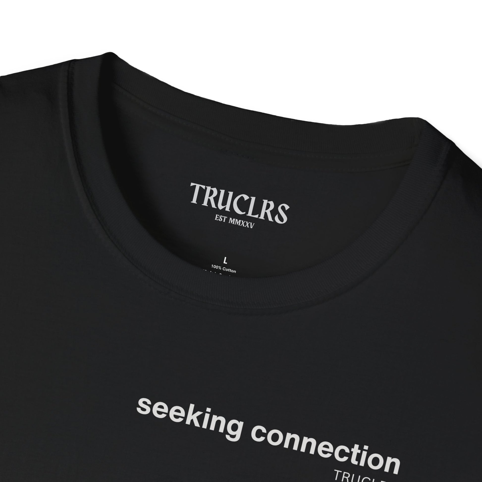 Black t-shirt with 'TRUCLRS' branding and text on a white background