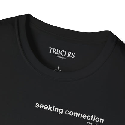 Black t-shirt with 'TRUCLRS' branding and text on a white background