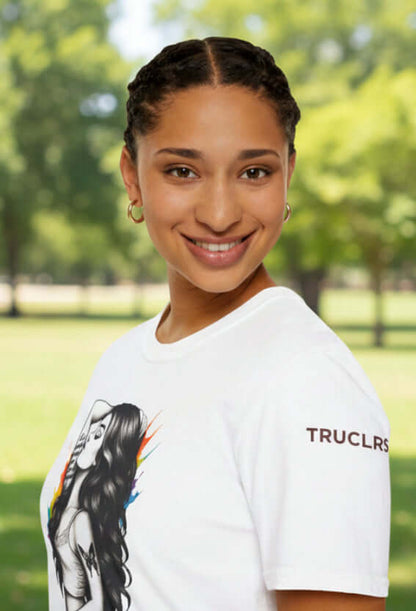 Model wearing Be You - Reimagined T-shirt with bold illustration and vibrant colors in a park setting.
