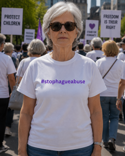 Woman wearing a white t-shirt with '#stophagueabuse' at a protest rally.