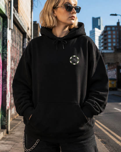 Black graphic hoodie with Lucky Shot poker artwork and subtle TRUCLRS chest logo.