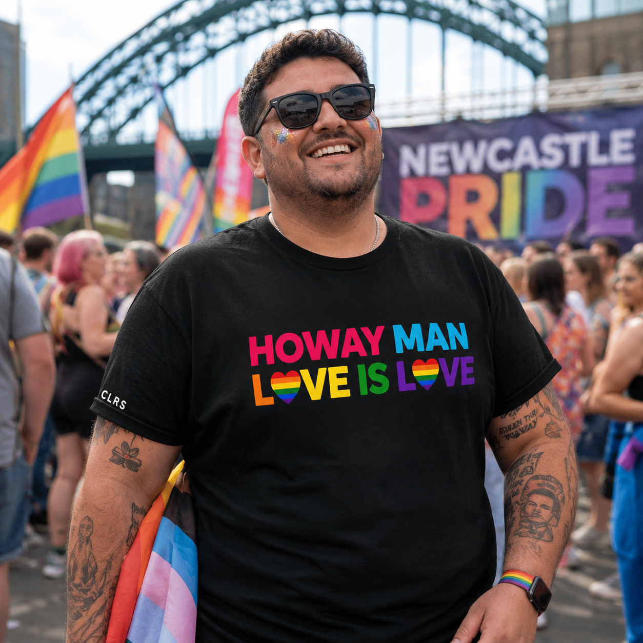 Pride festival fashion showcasing rainbow graphic T-shirts designed for the LGBTQ+ community and allies.