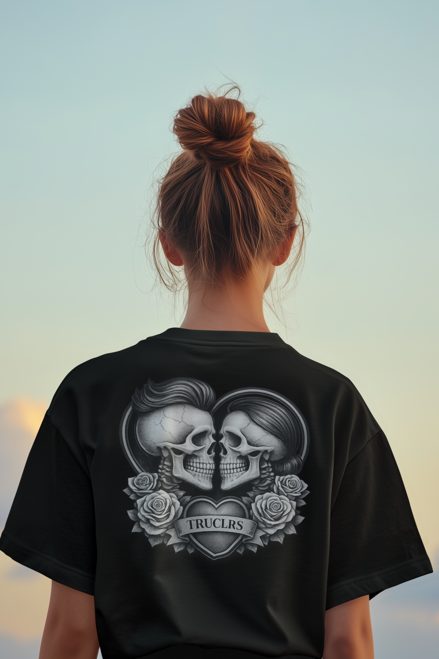 Gothic skull heart t-shirt with skeletal lovers and rose details printed on black cotton