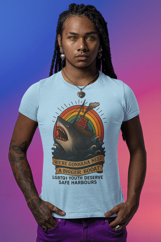 Person wearing a light blue t-shirt with a graphic design and text, standing against a gradient background. Jaws Quote. Shark Love. LGBTQ+ T shirt
