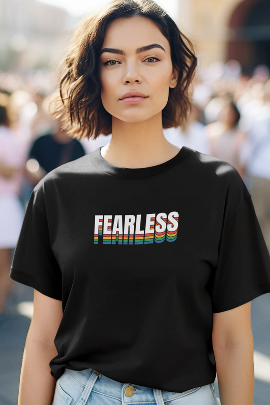 Black fearless t-shirt with bold rainbow-striped typography for LGBTQ+ pride fashion.
