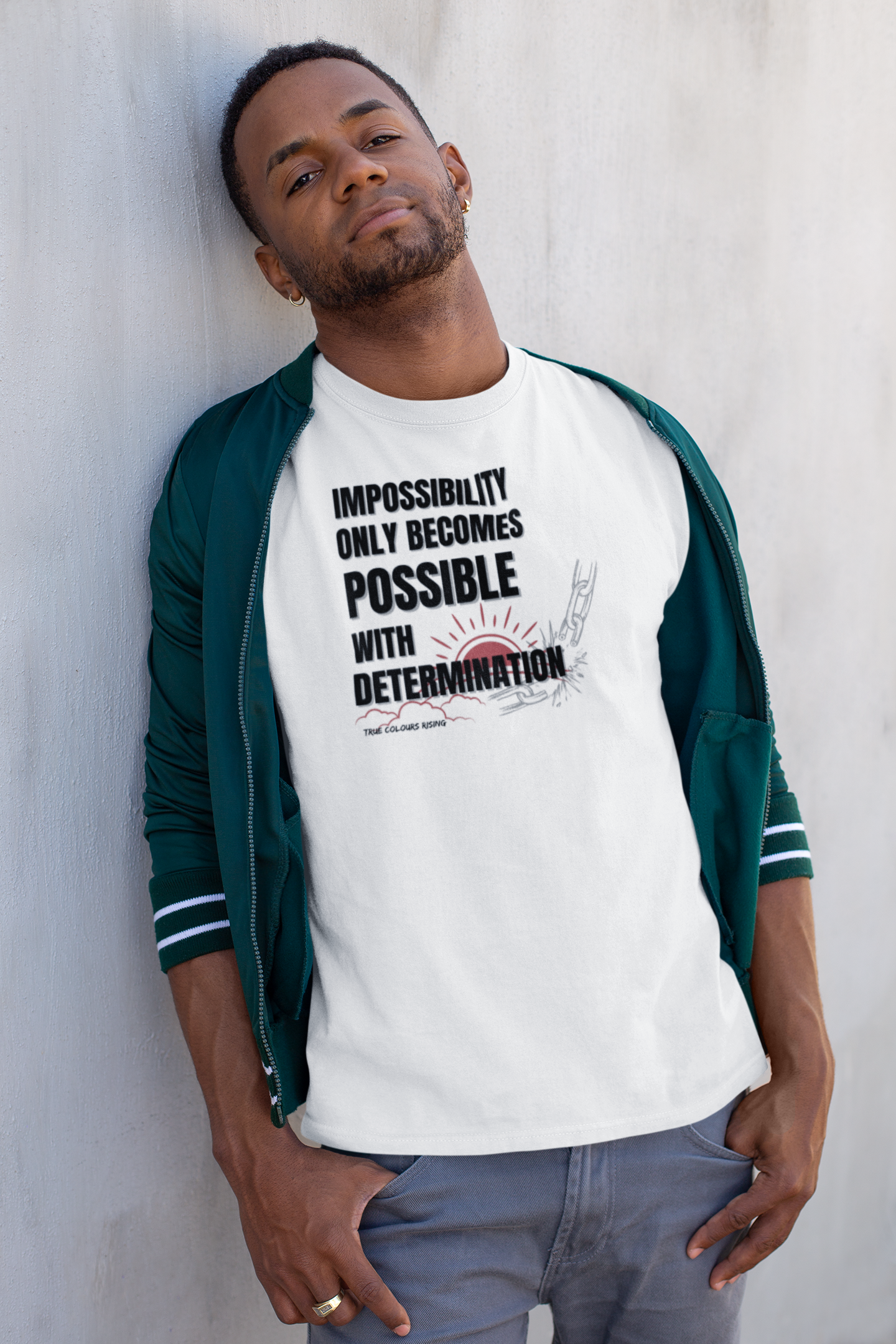 Determination T shirt in white, true colours rising. 