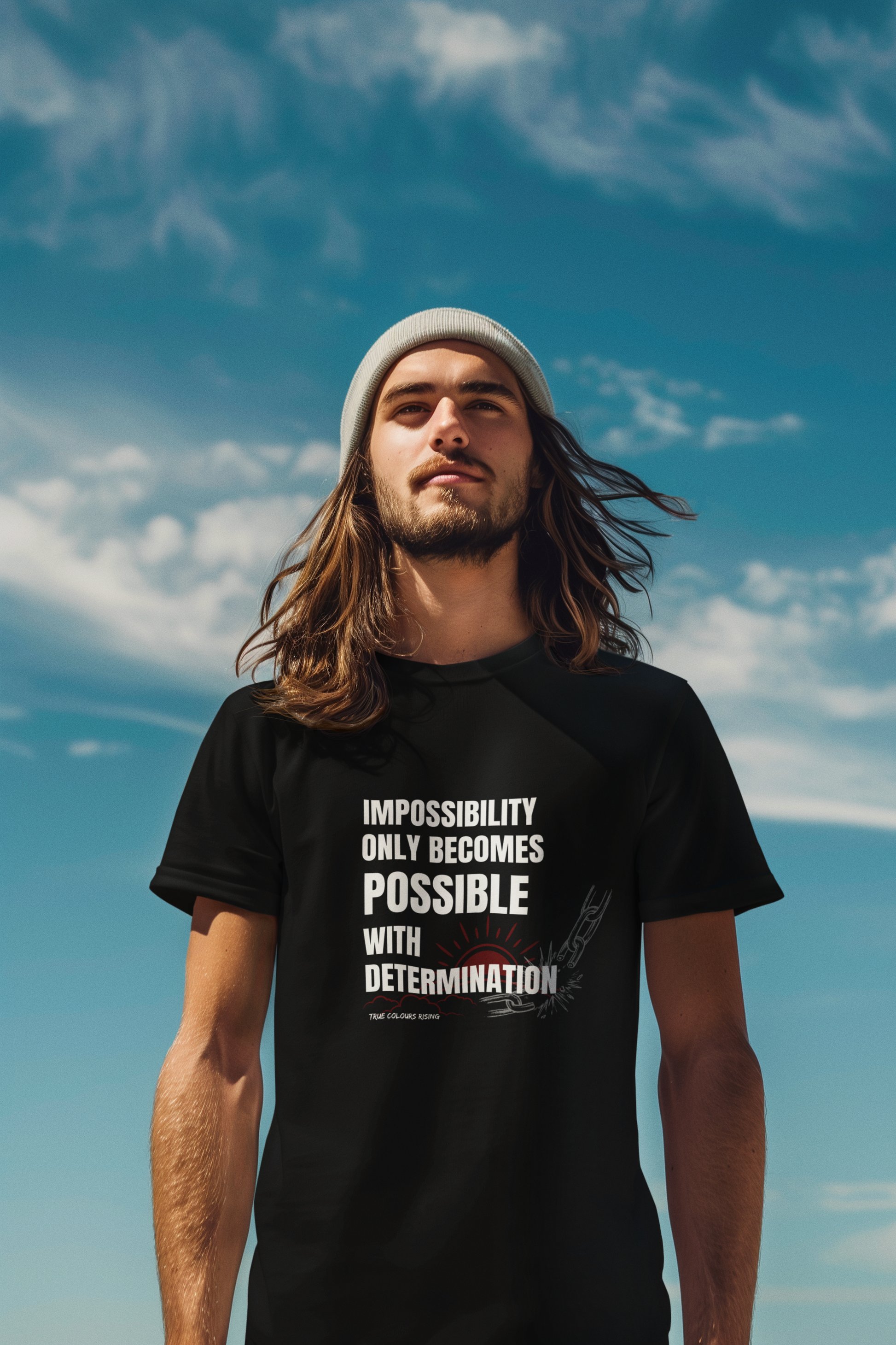 Minimalist Black T Shirt with large front print featuring a motivational quote, broken chain imagery, and sunrise graphic for strength and perseverance.