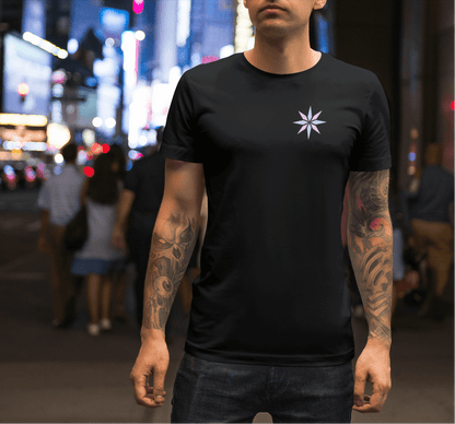 Black t-shirt with a small pastel asterisk star symbol printed over the left chest
